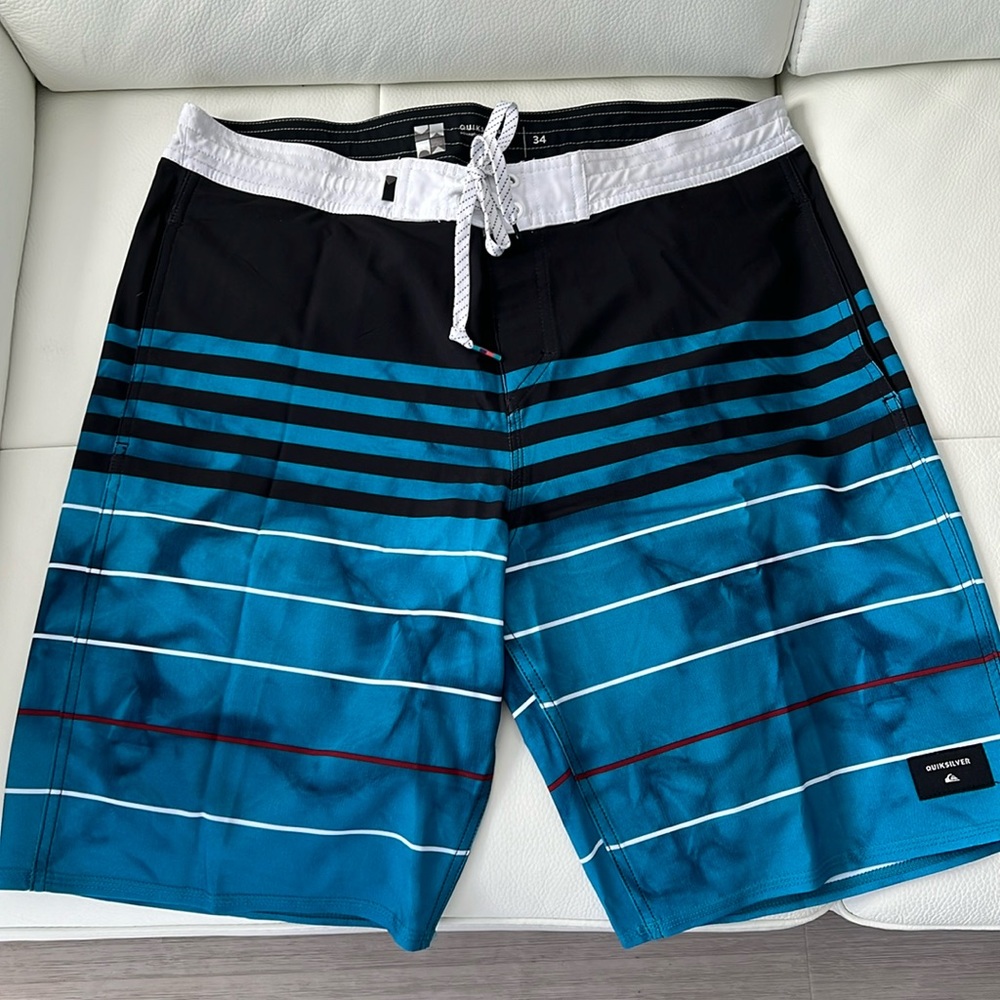 Quiksilver Board Shorts Black White and Turquoise in color Sz 34 EUC Worn once